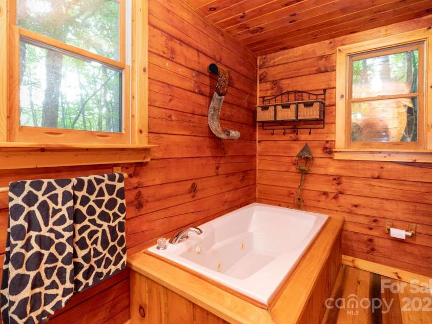 192 Granny Shepherd Road, Mars Hill, NC 28754.  MLS# CAR4285512, YatesRealty ID 18177. Enjoy a relaxing soak in this beautiful tub!