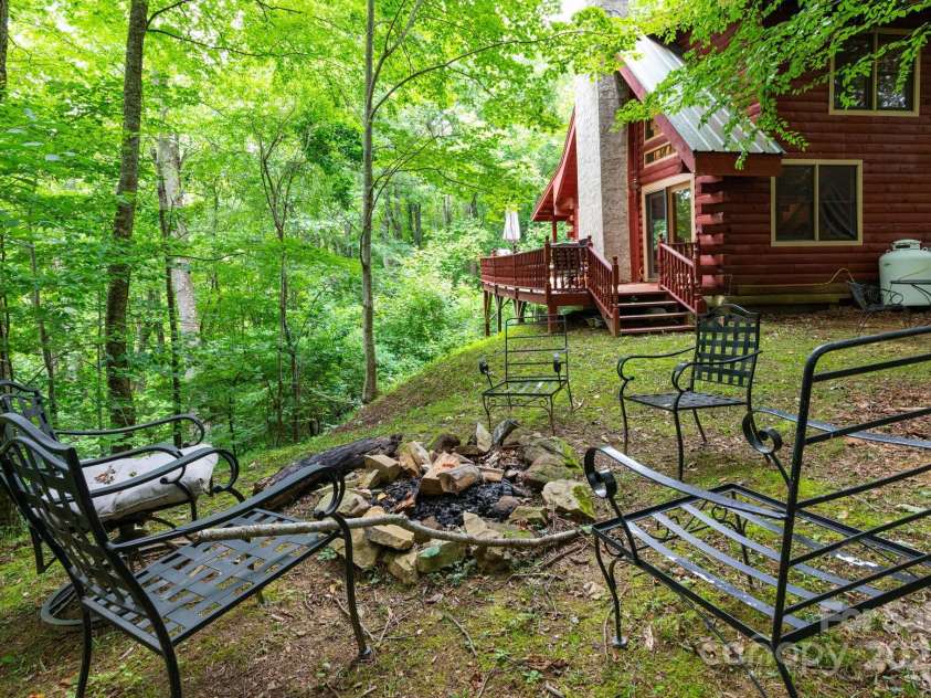 192 Granny Shepherd Road, Mars Hill, NC 28754.  MLS# CAR4285512, YatesRealty ID 18177. Fire pit for toasting marshmallows over a cozy fire.