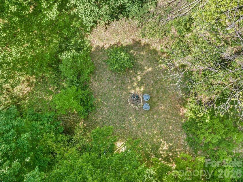 274 Poverty Branch Road, Barnardsville, NC 28709.  MLS# CAR4372195, YatesRealty ID 18179. Fire pit/ secondary home site from above