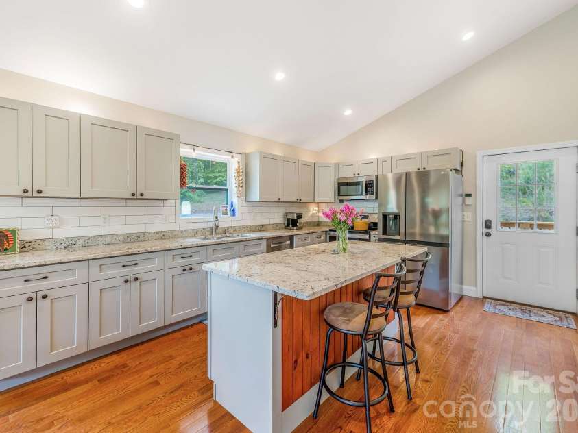 274 Poverty Branch Road, Barnardsville, NC 28709.  MLS# CAR4372195, YatesRealty ID 18179. Kitchen with island 
