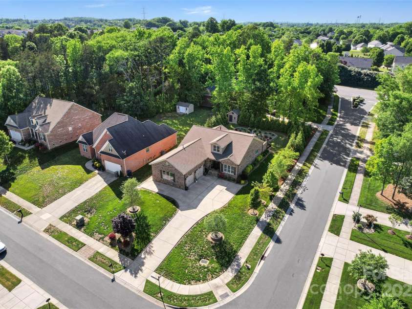 6010 Albiza Drive, Harrisburg, NC 28075.  MLS# CAR4256175, YatesRealty ID 18179. Corner Lot.