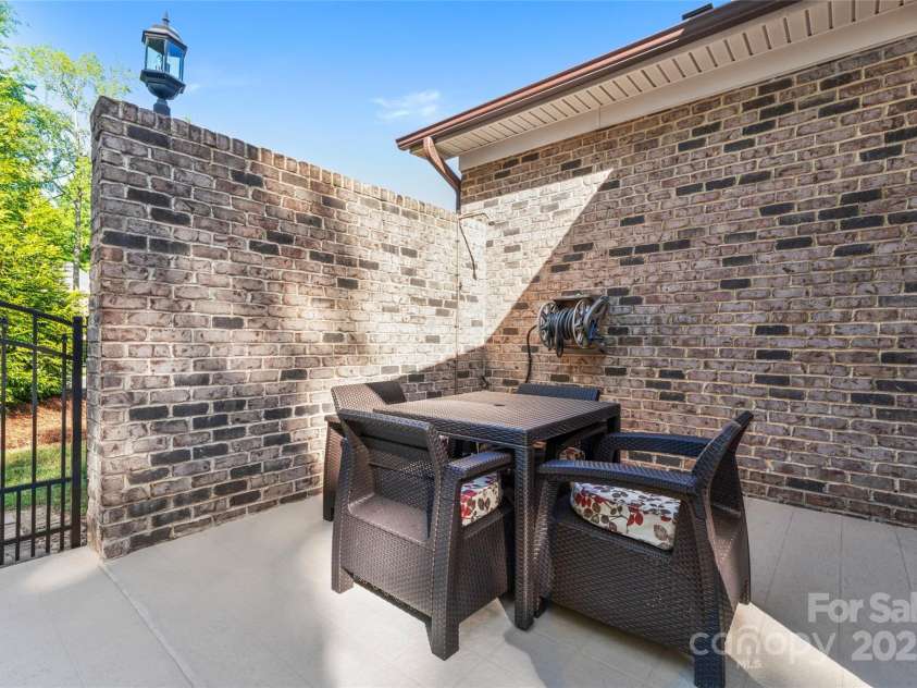 6010 Albiza Drive, Harrisburg, NC 28075.  MLS# CAR4256175, YatesRealty ID 18179. Outdoor Shower.