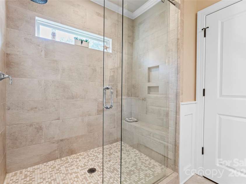 6010 Albiza Drive, Harrisburg, NC 28075.  MLS# CAR4256175, YatesRealty ID 18179. Oversized Walk-In Shower.