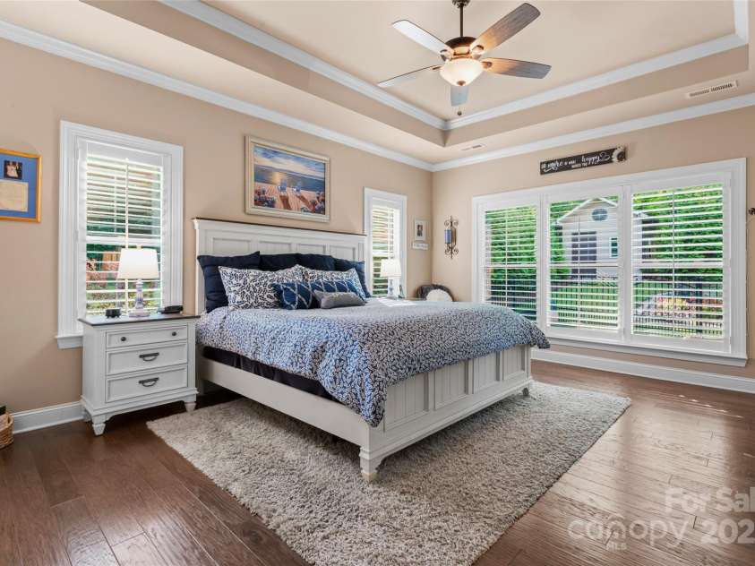 6010 Albiza Drive, Harrisburg, NC 28075.  MLS# CAR4256175, YatesRealty ID 18179. Spacious Primary Suite with Tons of Natural Light.