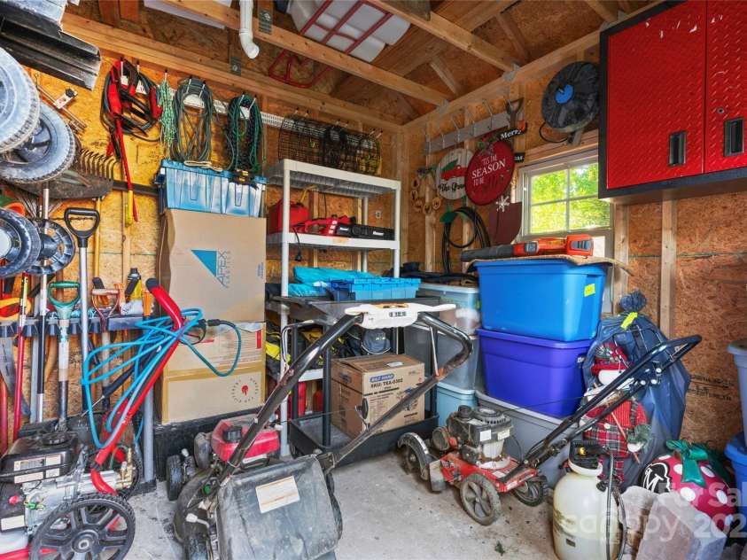 6010 Albiza Drive, Harrisburg, NC 28075.  MLS# CAR4256175, YatesRealty ID 18179. Storage Shed Interior.