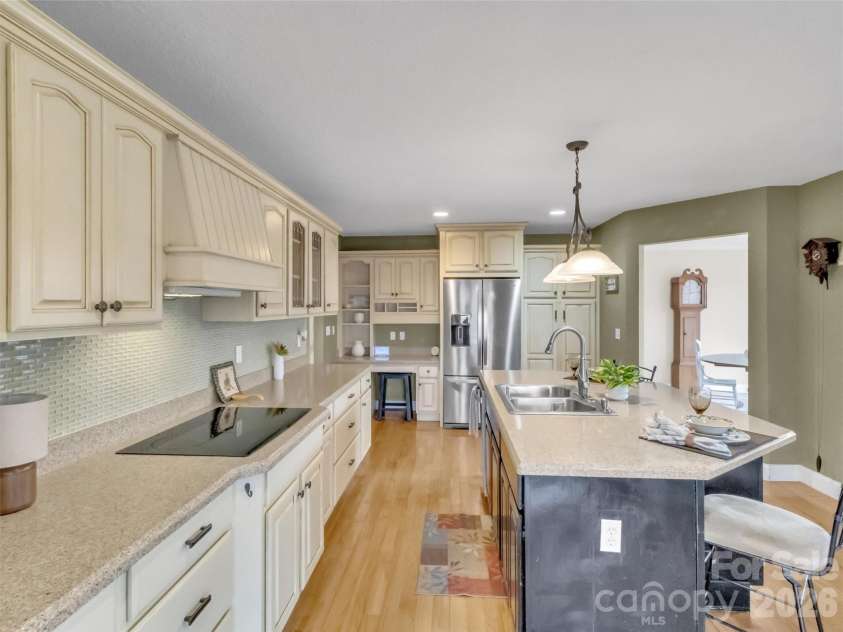 303 Forest Place, Candler, NC 28715.  MLS# CAR4342889, YatesRealty ID 18190. 