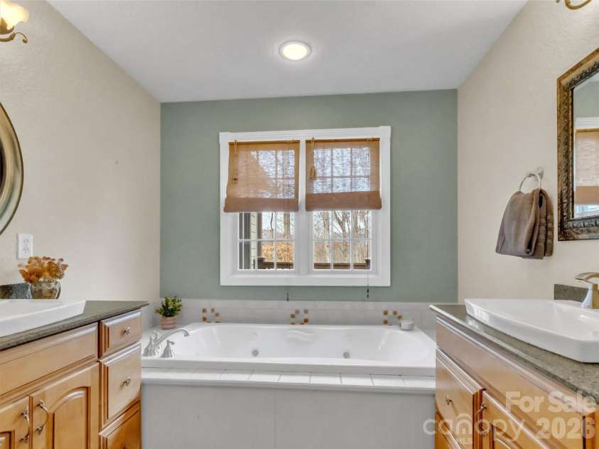 303 Forest Place, Candler, NC 28715.  MLS# CAR4342889, YatesRealty ID 18190. 