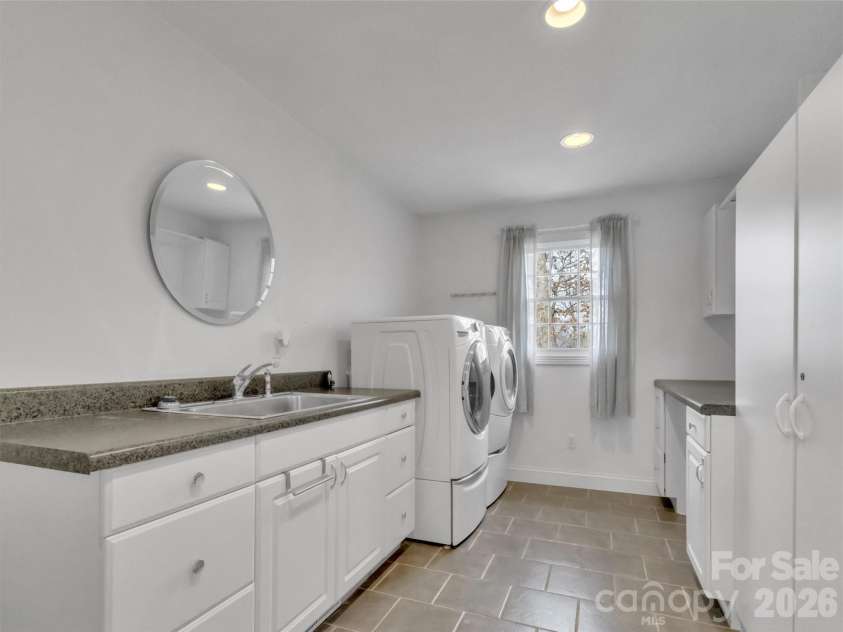 303 Forest Place, Candler, NC 28715.  MLS# CAR4342889, YatesRealty ID 18190. 