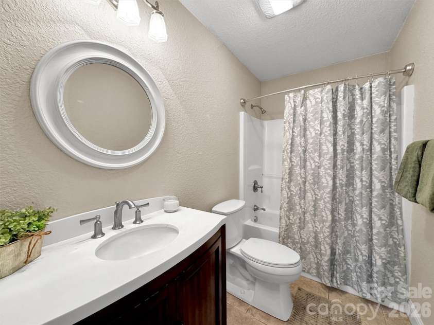 303 Forest Place, Candler, NC 28715.  MLS# CAR4342889, YatesRealty ID 18190. 