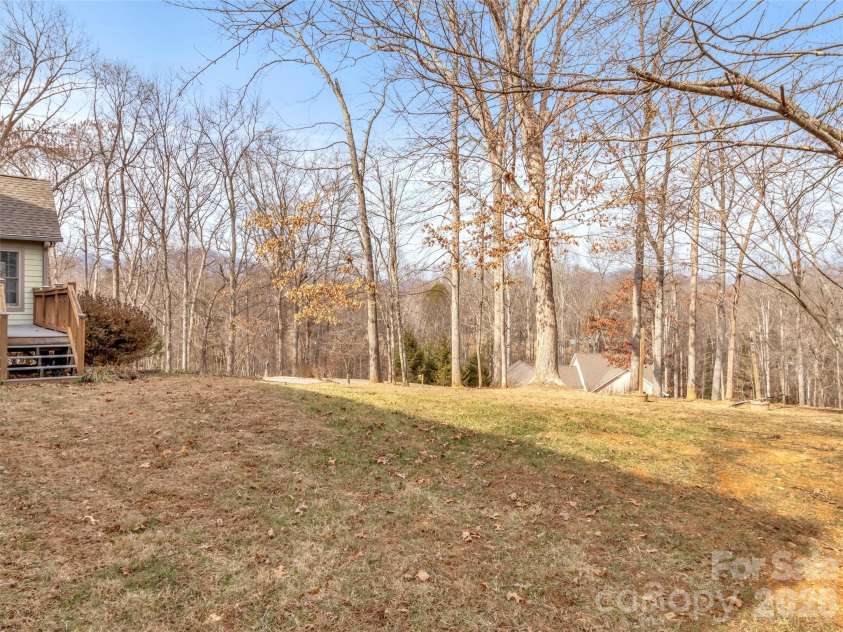 303 Forest Place, Candler, NC 28715.  MLS# CAR4342889, YatesRealty ID 18190. 