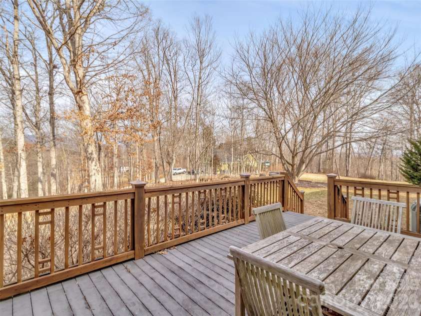 303 Forest Place, Candler, NC 28715.  MLS# CAR4342889, YatesRealty ID 18190. 