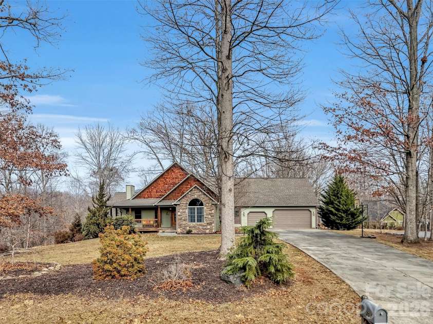 303 Forest Place, Candler, NC 28715.  MLS# CAR4342889, YatesRealty ID 18190. 