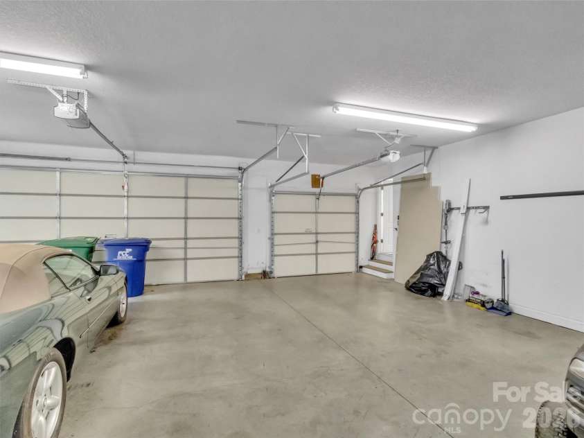 303 Forest Place, Candler, NC 28715.  MLS# CAR4342889, YatesRealty ID 18190. 