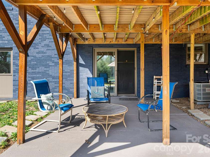 10 Lance Lane, Asheville, NC 28806.  MLS# CAR4328641, YatesRealty ID 18191. Covered patio with direct backyard access