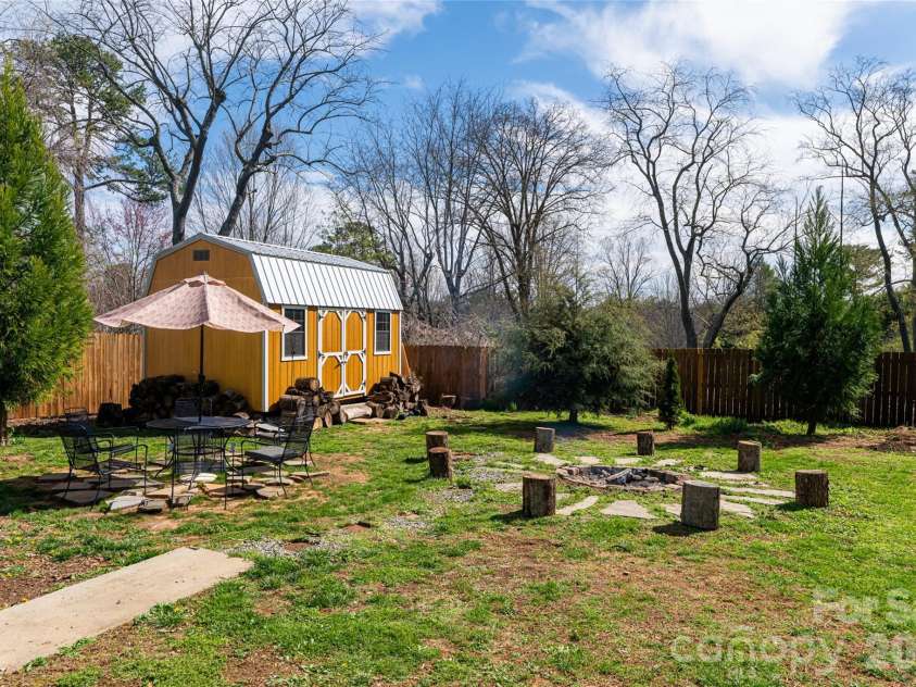10 Lance Lane, Asheville, NC 28806.  MLS# CAR4328641, YatesRealty ID 18191. Level yard with firepit and garden space