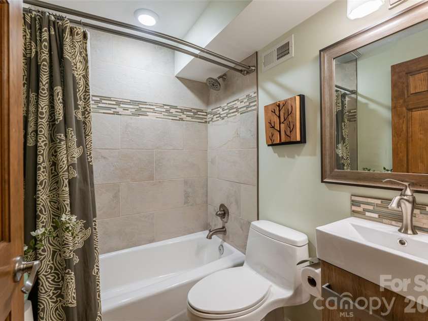 10 Lance Lane, Asheville, NC 28806.  MLS# CAR4328641, YatesRealty ID 18191. Lower Level-additional full bath for flexibility