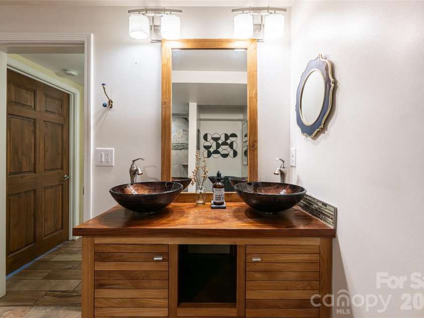 10 Lance Lane, Asheville, NC 28806.  MLS# CAR4328641, YatesRealty ID 18191. Lower Level-double vanity 
