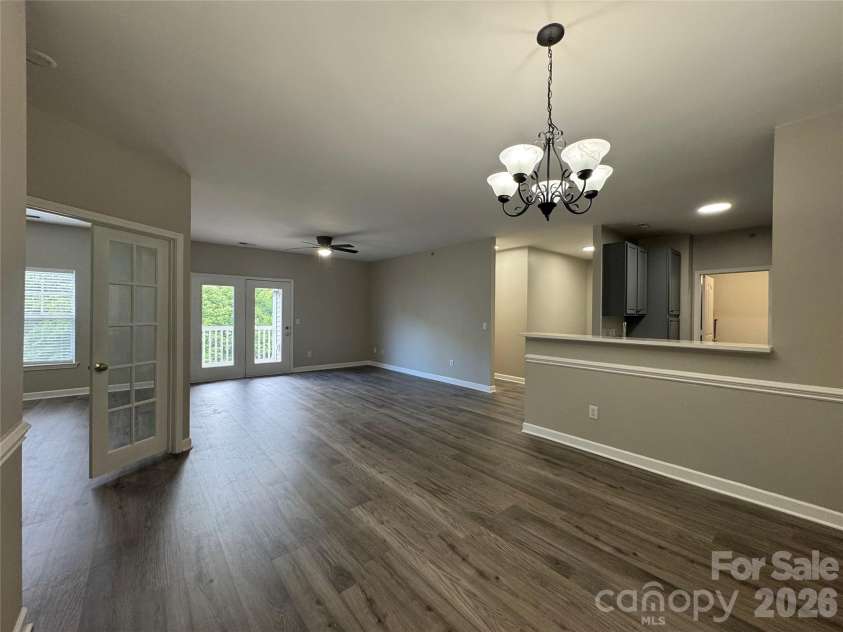 10676 Hill Point Court, Charlotte, NC 28262.  MLS# CAR4388592, YatesRealty ID 18194. View of Flex Space / Office, Living Room & Kitchen from Dining Area