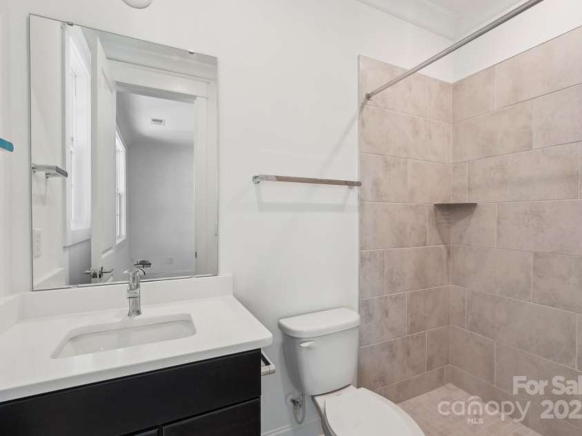220 Windy Dell Drive, Tega Cay, SC 29708.  MLS# CAR4266344, YatesRealty ID 18198. 1st floor guest bath