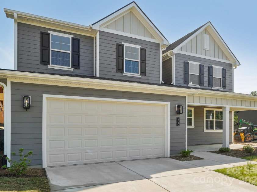 220 Windy Dell Drive, Tega Cay, SC 29708.  MLS# CAR4266344, YatesRealty ID 18198. Exterior of Home