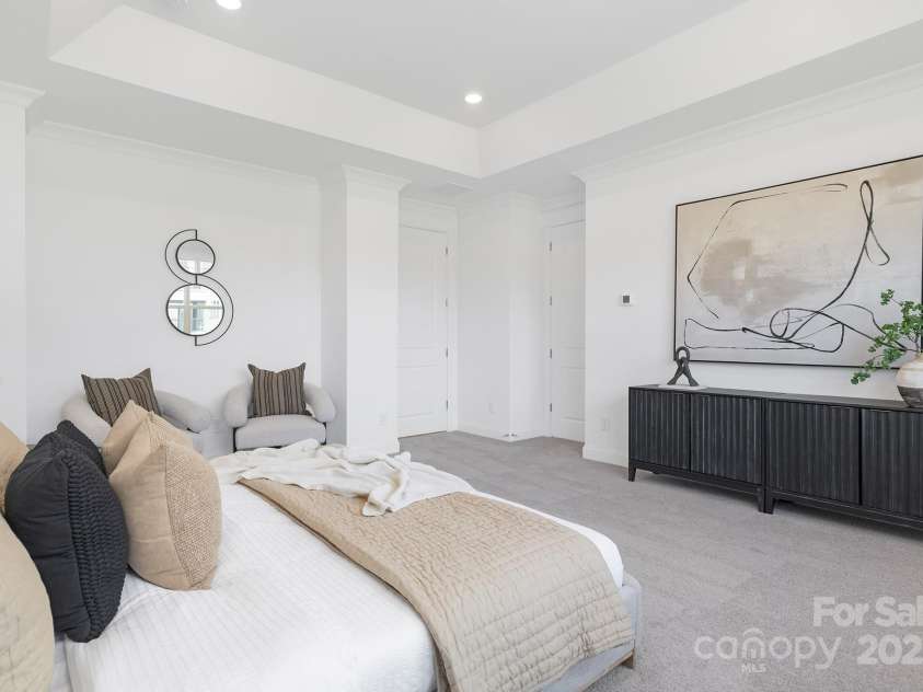 220 Windy Dell Drive, Tega Cay, SC 29708.  MLS# CAR4266344, YatesRealty ID 18198. Primary bedroom