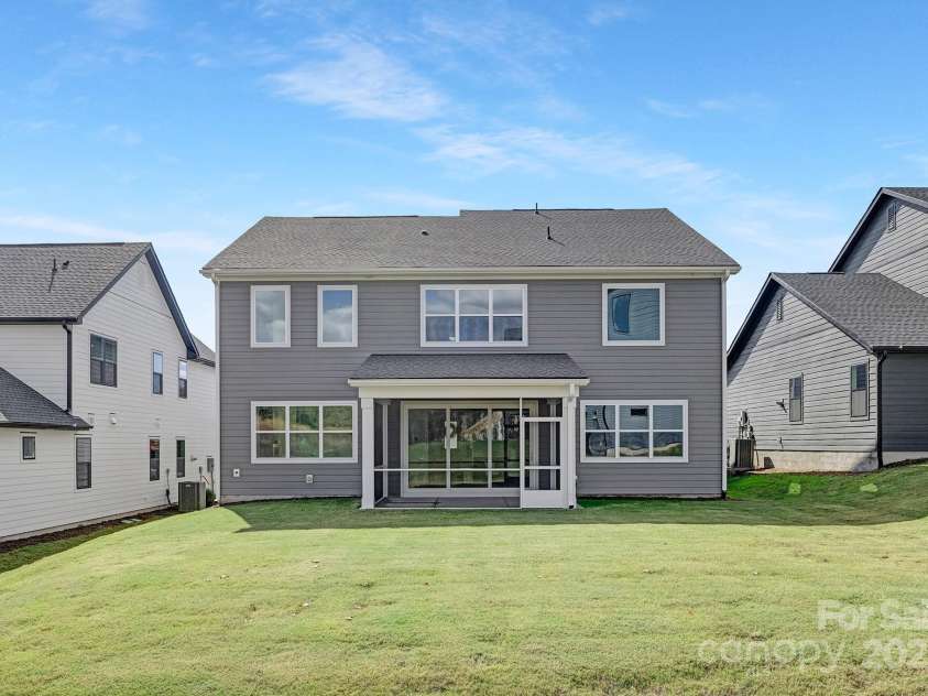 220 Windy Dell Drive, Tega Cay, SC 29708.  MLS# CAR4266344, YatesRealty ID 18198. Rear of home