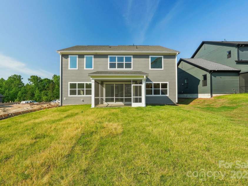 220 Windy Dell Drive, Tega Cay, SC 29708.  MLS# CAR4266344, YatesRealty ID 18198. Rear yard