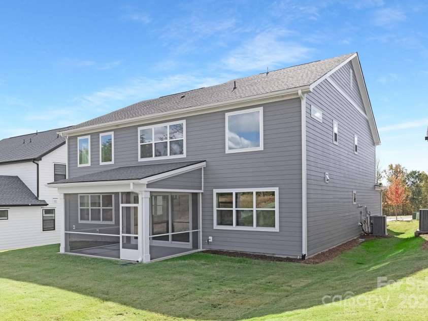 220 Windy Dell Drive, Tega Cay, SC 29708.  MLS# CAR4266344, YatesRealty ID 18198. Screened in Patio