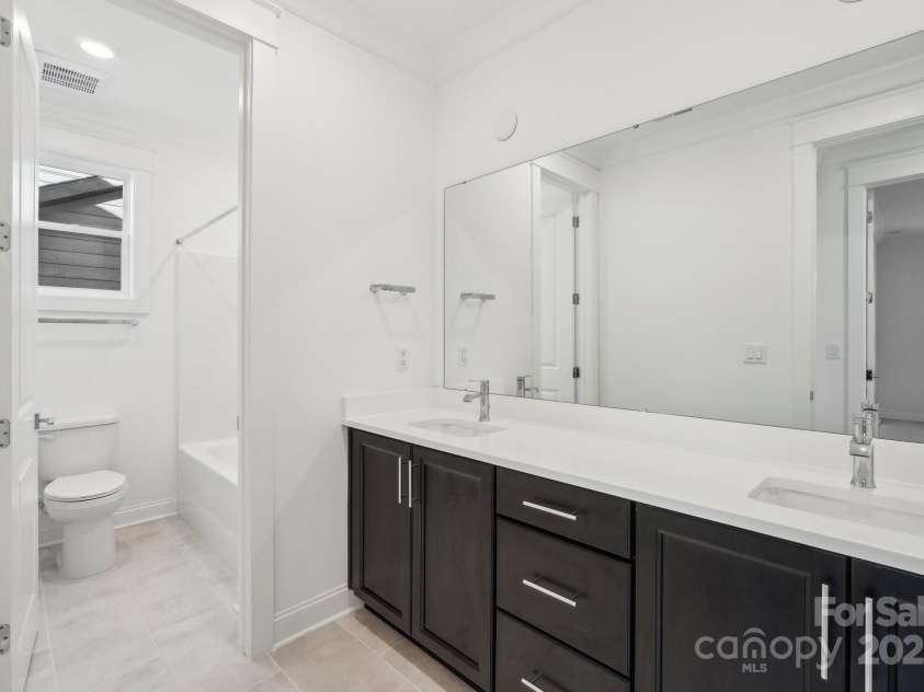 220 Windy Dell Drive, Tega Cay, SC 29708.  MLS# CAR4266344, YatesRealty ID 18198. Secondary bathroom