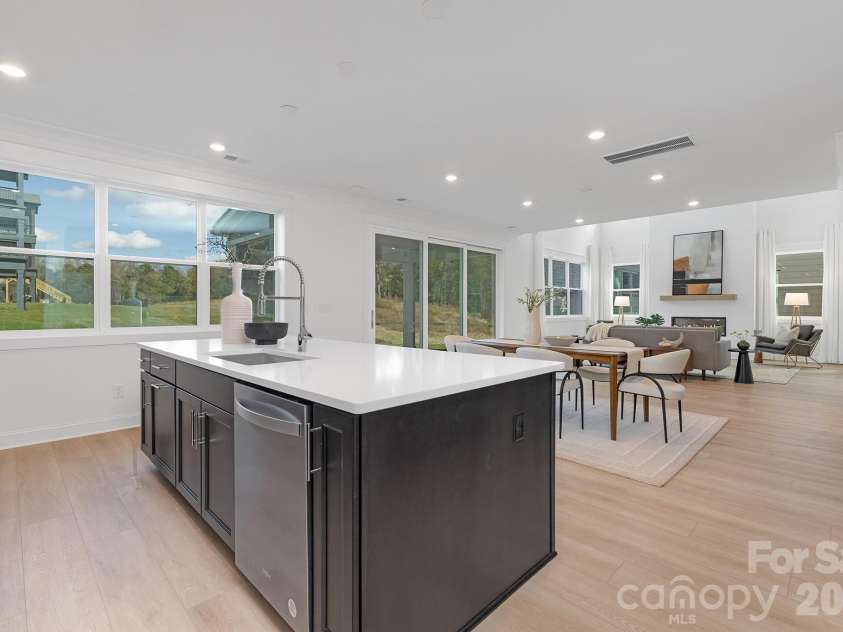 220 Windy Dell Drive, Tega Cay, SC 29708.  MLS# CAR4334670, YatesRealty ID 18198. Staged Kitchen, Dining and Living Room