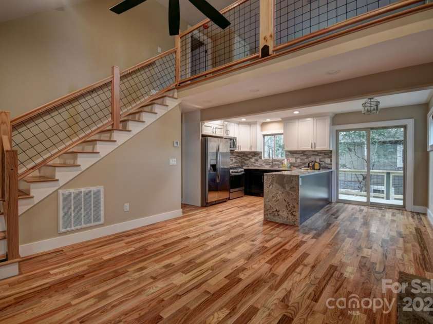 20 Lisa Lane, Maggie Valley, NC 28751.  MLS# CAR4126397, YatesRealty ID 182. Great Room with Waterfall Granite Countertop