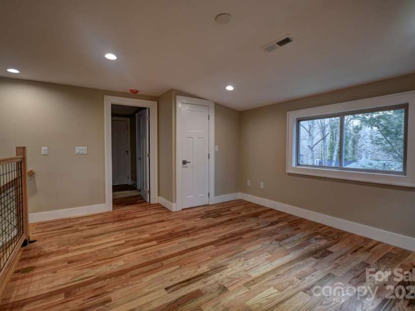 20 Lisa Lane, Maggie Valley, NC 28751.  MLS# CAR4126397, YatesRealty ID 182. Loft/Office - Beautiful solid Oak Hardwood Floors Throughout