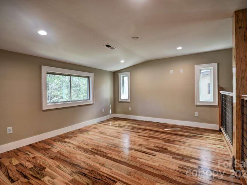 20 Lisa Lane, Maggie Valley, NC 28751.  MLS# CAR4126397, YatesRealty ID 182. Loft/Office with beautiful Hardwood Oak Floors