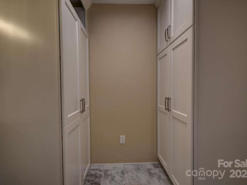 20 Lisa Lane, Maggie Valley, NC 28751.  MLS# CAR4126397, YatesRealty ID 182. Maytag Laundry Center on Left - Linen Cabinet on Right