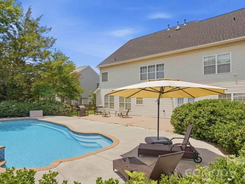 5008 Rosewater Lane, Indian Trail, NC 28079.  MLS# CAR4335449, YatesRealty ID 18201. Stunning Backyard