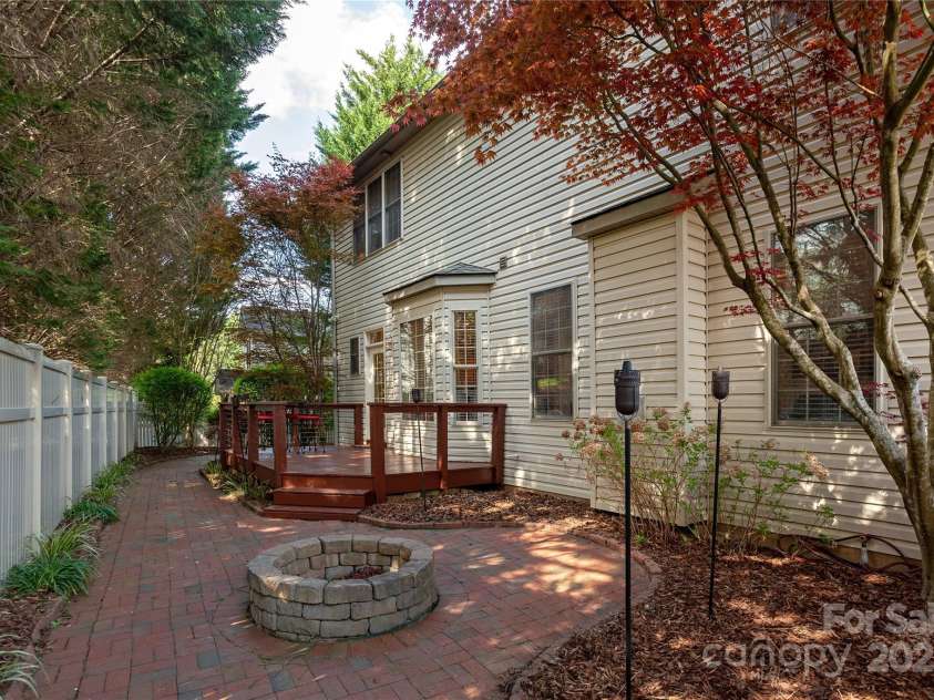 219 Rivercrest Boulevard, Arden, NC 28704.  MLS# CAR4124983, YatesRealty ID 1821. Back Patio Fenced with Firepit