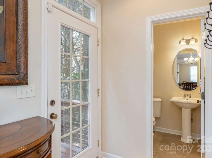 219 Rivercrest Boulevard, Arden, NC 28704.  MLS# CAR4124983, YatesRealty ID 1821. Powder Room / Back Door to Patio and Deck