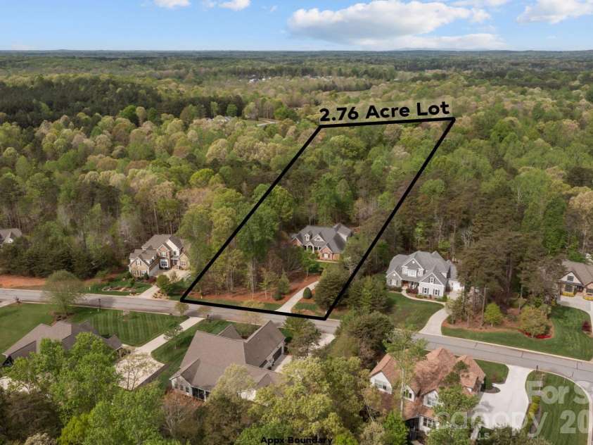 3143 James Plantation Drive, Denver, NC 28037.  MLS# CAR4366315, YatesRealty ID 18210. Aerial view with approximate property boundaries highlighting the expansive 2.76-acre homesite.
