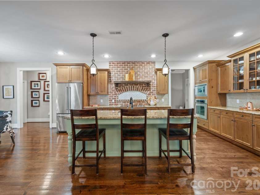 3143 James Plantation Drive, Denver, NC 28037.  MLS# CAR4366315, YatesRealty ID 18210. Kitchen and living areas seamlessly connected for an open and functional layout.