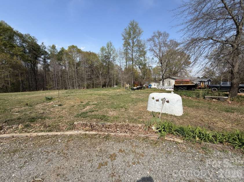 183 Pebble Drive, Mooresboro, NC 28114.  MLS# CAR4370880, YatesRealty ID 18214. Extra Parcel