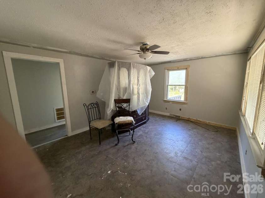 183 Pebble Drive, Mooresboro, NC 28114.  MLS# CAR4370880, YatesRealty ID 18214. Living Room
