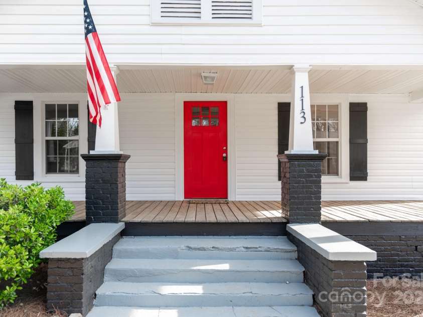 113 Elwood Street, Kannapolis, NC 28081.  MLS# CAR4266115, YatesRealty ID 18215. Rocking Chair front porch