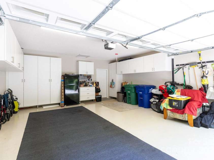 127 Poppy Lane, Asheville, NC 28803.  MLS# CAR4252357, YatesRealty ID 18218. Main Level Garage off Mudroom / Kitchen