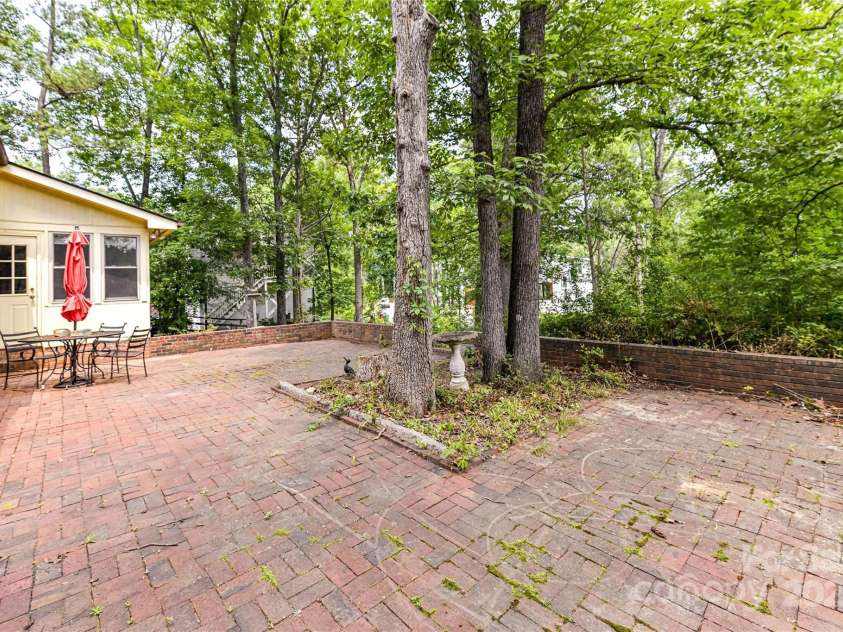 541 Greenway Street, Davidson, NC 28036.  MLS# CAR4264185, YatesRealty ID 18223. Paver patio in backyard