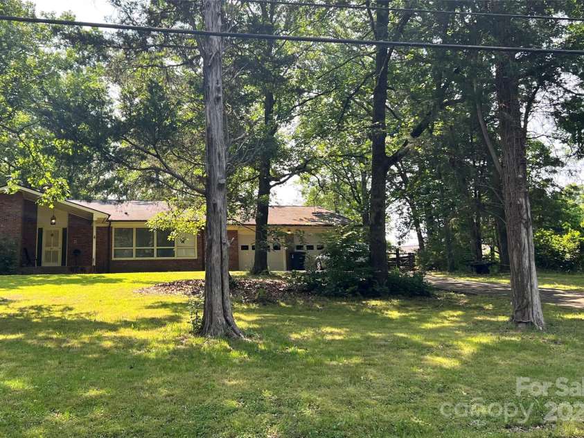 541 Greenway Street, Davidson, NC 28036.  MLS# CAR4264185, YatesRealty ID 18223. Property sets up for an exempt subdivision with 227 feet of road footage
