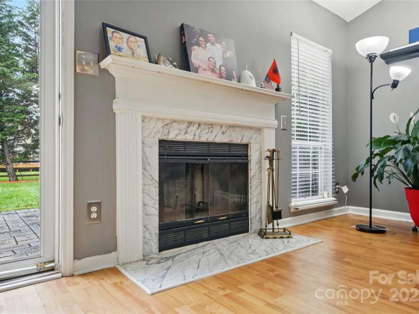 6717 Bickham Lane, Charlotte, NC 28269.  MLS# CAR4257776, YatesRealty ID 18226. Wood burning