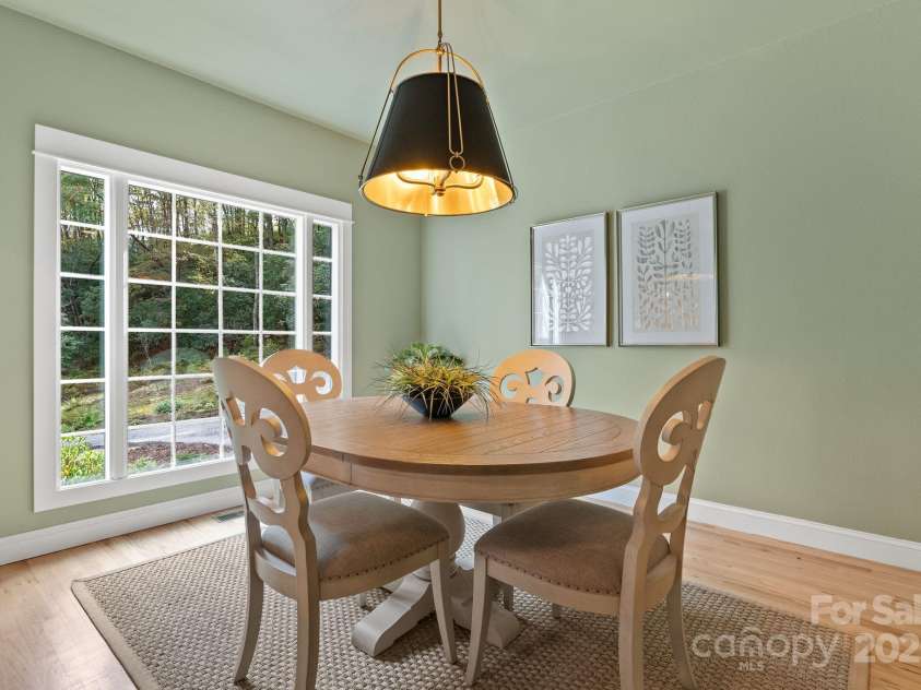 605 Salola Lane, Brevard, NC 28712.  MLS# CAR4312088, YatesRealty ID 18227. Huge windows let the sunshine in...