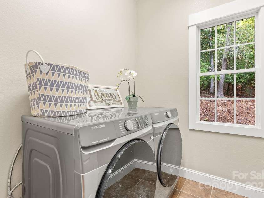 605 Salola Lane, Brevard, NC 28712.  MLS# CAR4312088, YatesRealty ID 18227. New stainless washer & dryer in designated laundry room