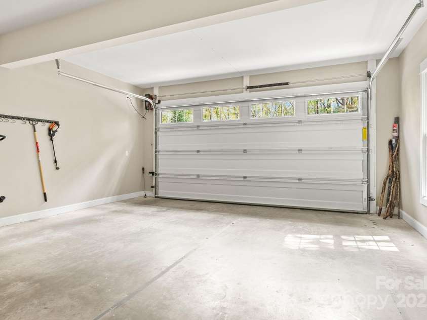 605 Salola Lane, Brevard, NC 28712.  MLS# CAR4312088, YatesRealty ID 18227. The tidy, 2 car garage has been freshly painted