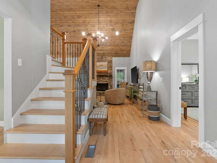 605 Salola Lane, Brevard, NC 28712.  MLS# CAR4312088, YatesRealty ID 18227. Welcoming entry with soaring ceilings...